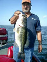 Manny Gloria caught 9.12 lb bass with JW Peterson on 7/8/08 