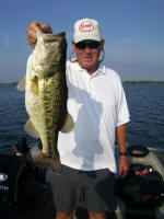 Mike Geer with a nice bass caught while fishing with Pro Guide John Tanner 7-15-08.  