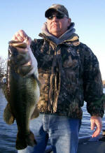 Mike Biggins with a fat 9 lb 13 oz prespawn beauty, caught yesterday with Pro Guide Tom Redington on a lipless crankbait.  