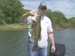 Josh with a 10 lb bass he caught in 2 ft. of water, fishing with Pro Guide Tony Clark!