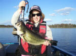 Molly Tanner with a nice bass caught fishing with her dad  Pro Guide John Tanner