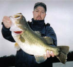 Rick Harrison with his biggest bass caught while fishing with Pro Guide Jimmy Everett