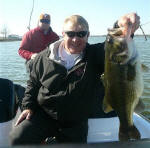 Pro Guide Gary Johnson with a 7 1/2 # big bass caught on Wednesday, March 12, at Lake Fork using a shallow runner made by AMP LURES
