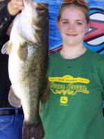 Her big fish was 25 1/2 inches long and 19 1/2 inches in Girth.  She caught it today at 2:45 pm in 9 ft. of water fishing a Reaction Innovations Sweet Beaver