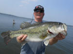 Steve Helm with a 8 lb 4oz Bass fishing caught fishing with Pro Guide David Vance