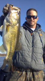 Scott with a nice january bass. Guide john Tanner 