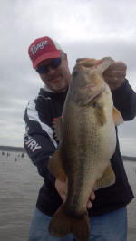 Pro Guide John Tanner with a Lake Fork an 8.14 bass