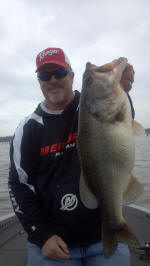 Pro Guide John Tanner with a Lake Fork a 7 1/2 lb. bass caught 2-19-14