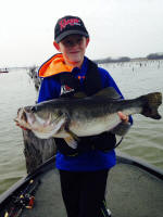 Tyler Evans (10 years old) caught this 8.9 pound Largemouth Bass on his favorite Rattletrap while fishing with Lake Fork Guide John Morris.