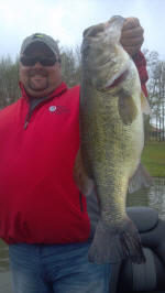 Henry Akins with his biggest bass ever while fishing with pro guide John Tanner 