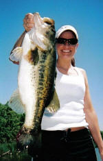 Mrs Hunt with a trophy bass while fishing with Pro Guide Jimmy Everett