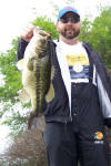 Chad Henze from Connecticut with a chunk that he caught on a Top Dog Lizard,