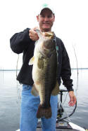 Greg McMillan with an 8-13 caught on a watermelon Top Dog lizard on 4/25