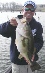Pro Guide Tom Redington with a bass over 8 lbs.