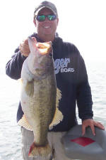 Pro Guide Tom Redington with a spawned out 8 lb'er from last week.  Too bad he didn't catch her a month ago!