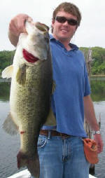 Tim with his biggest bass ever, a spawned out 23.5" lunker that still weighed 7.5 lbs. Caught 5/4, fishing with Pro Guide Tom Redington