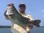 Steve Good from Shreveport with a 7 1/2 pound bass caught while fishing with  Pro Guide John Tanner.