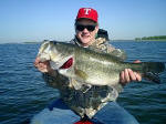 Doug Winters with a 12.31 lb Lake Fork Trophy Bass fishing with Pro Guide J.W. Peterson.