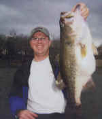 Brian Aron with a Lake Fork bass measuring 24 1/2 inches, caught while fishing with Guide Dean Stroman