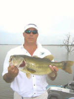 Jerry Kelly, with a nice Lake Fork bass caught while fishing with Pro Guide Marc Mitchell.