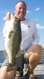 Pro Guide Tom Redington with a Lake Fork bass weighing over 8lbs