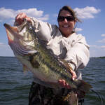 Elaine Shultz with a 8 lb. bass caught with Pro Guide John Tanner on 5/15. She caught this HOG on a Mutant by www.grandebass.com