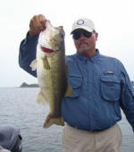 Micheal Whaley with a nice bass he caught fishing with   Pro Guide  John Tanner on a Carolina rigged Grande Twig by www.grandebass.com.