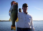 Tony Montgomery from Zion, Ark with a nice bass caugt 11-22-05. The top three caught on this day, were in the 7 pound range, not bad after a cold front.