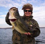 Sandy Cariker with a big bass she caught on a red rattle trap