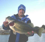 James Caldemeyer from Gilmer, TX with a 6 1/2 pounder caught on 1-4-06. They caught nice fish in the 3 to 7 pound range on red rattle traps and black and blue jigs in 3 to 6 ft. of water. James lost one pushing 10 pounds on the jig. It was SAD!
