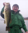 Ron Garner of Martin Gas, Kilgore, TX. and Pro Guide John Tanner  with several nice bass they caught 2/22 on a red lipless crankbait. 