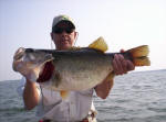 Blair Stenson with a 10 pound moose caught on a Mutant by www.grandebass.com. Pro Guide John Tanner