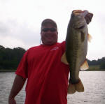 Big Billy Weaver from Waco TX with a Hog he caught on July 6th. Bass fishing with Pro Guide John Tanner