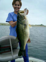 Sandy Russell with a 12.2 lb bass caught at Lake Fork while fishing with Lake Fork Pro Guide JW Peterson