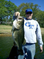 Andy Bardach with a 12.43 lb Bass caught while fishing with Pro Guide J.W. Peterson.