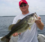 Kevin with a nice 7lb. bass caught while bass fishing with Pro Guide Tom Redington