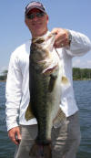 Kevin with another  7lb. bass caught while bass fishing with Pro Guide Tom Redington