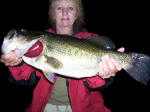 Mrs. Barker with an 11 lbs and 1 oz bass that she caught on June 3rd.