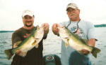 The Mckowen father and son team both boated their biggest bass ever on the same cast with Pro Guide Jimmy Everett
