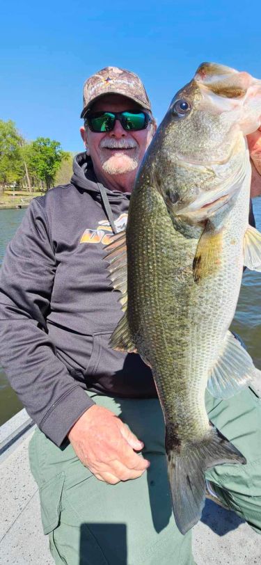 March 2024 Pro Guide Tom Evans with a big bass