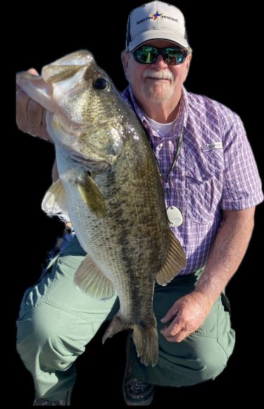 Pro Guide Tom Evans with a big bass